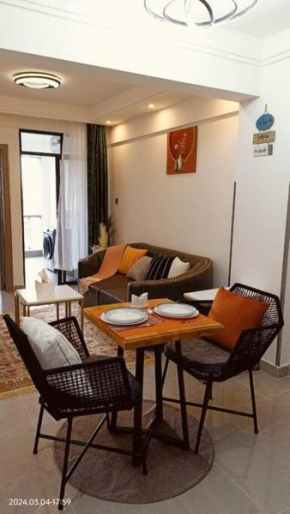 Sky-high Serenity: Your Modern 1BR Retreat on the 10th Floor